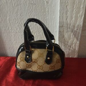 Elegant Black and Tan Designer Handbag